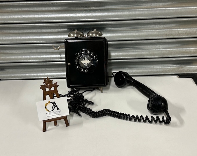 A 1950's Swiss Weidmann Bakelite Wall Mounted Telephone