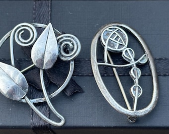 Two Vintage Silver Hallmarked Arts & Crafts Brooches - Rennie Macintosh Design to one the other has an Arts and Crafts design