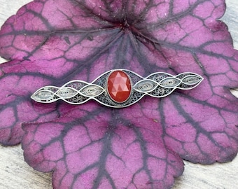 Antique White Metal Filigree Bar Brooch With An Oval Carnelian Coloured Stone