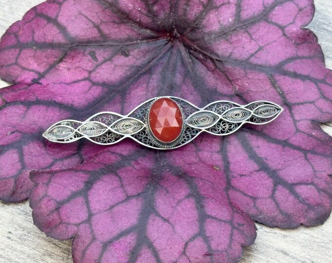 Antique White Metal Filigree Bar Brooch With An Oval Carnelian Coloured Stone