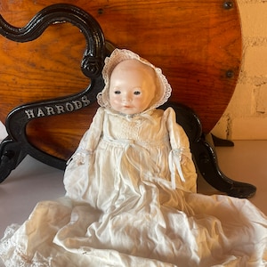 Rare German L Amberg & Sons Newborn Doll with Fabric Body and Bisque Head