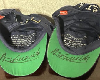 Rare Pair Of Le Mans Millenium ATS Racing Baseball Caps signed by 4 Times Winner Henri Pescarolo
