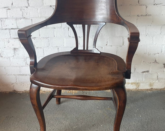 19th Century Mahogany Clerks Chair With A Fan Shaped Back Support.