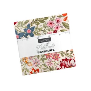 May include: A stack of fabric squares with a floral pattern in shades of pink, blue, and red on a cream background. The fabric is labeled "Fieldrush" by BASICGREY. A ruler is included.