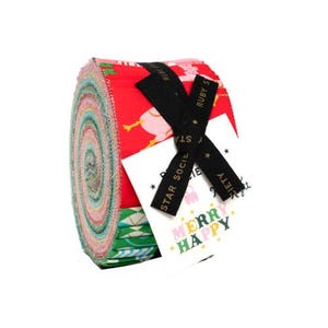 May include: Rolled fabric bundle with a variety of colorful patterns, including red with a festive design. Black ribbons with gold text and a tag that says "MERRY HAPPY" are attached. The bundle is on a white background.