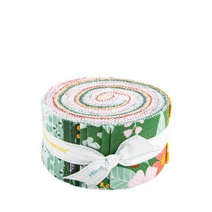May include: A rolled bundle of fabric strips in various floral and leaf patterns. The fabric is tied with a white ribbon that has text on it. The color palette includes green, pink, and white.