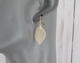 gold leaf earrings filigree small cut out leaves dangle earrings gold dangle earrings 1 7/16&quot; long very lightweight dangles