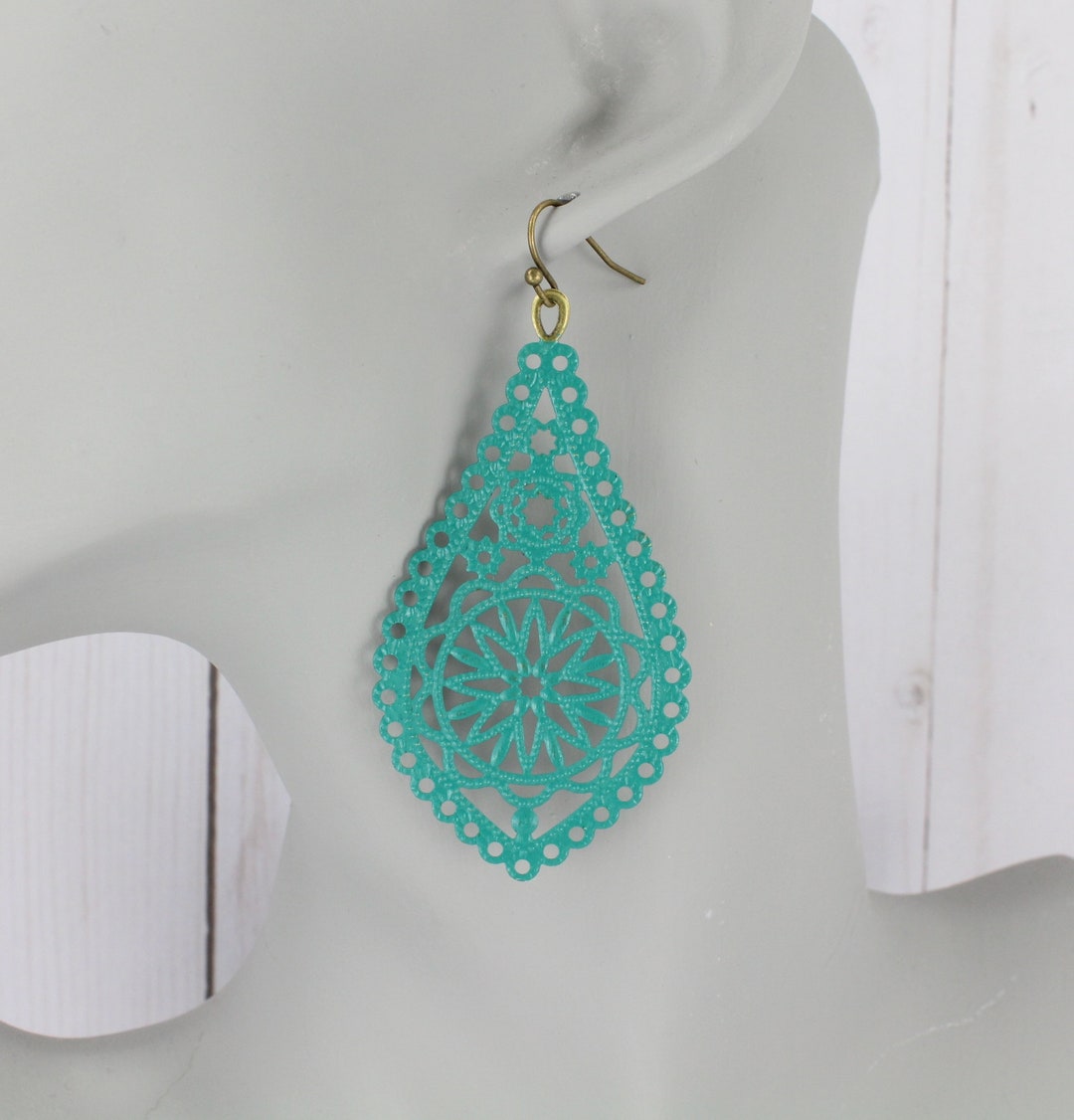 Filigree long drop earrings in green main image 1