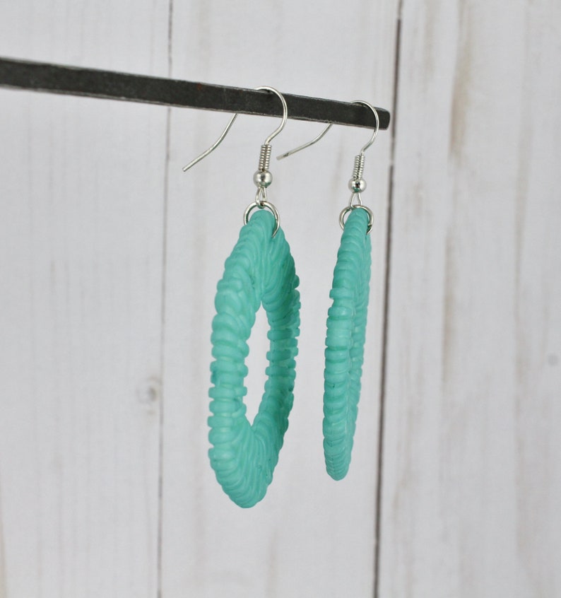 Aqua earrings woven lightweight plastic dangle cutout oval hexagon 2.5 long Turquoise Teal plastic basketweave pendant