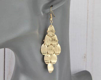 Gold chandelier earrings dangle 3 1/8" long lightweight wiggly layered flowy oval pendants brushed look charms