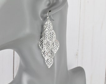 Silver chandelier earrings filigree leaf leaves earrings dangle cut out pattern lightweight 2 7/8" long shiny silver leaves