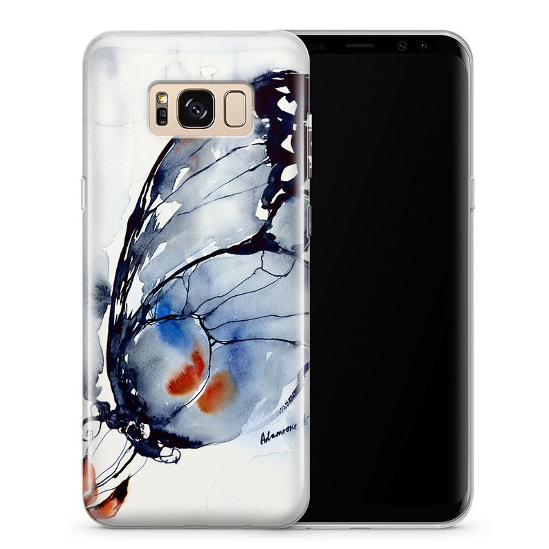 May include: A clear phone case with a watercolor painting of a blue butterfly with orange accents. The case is designed for a Samsung Galaxy S8 phone.