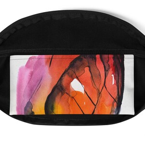 May include: Abstract watercolour painting with shades of pink, orange, yellow, and black. The colours blend together to create a swirling, organic pattern.