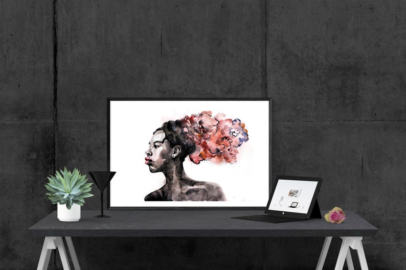 May include: A black and white watercolor painting of a person with a red and pink floral design in their hair. The painting is framed and hanging on a wall.