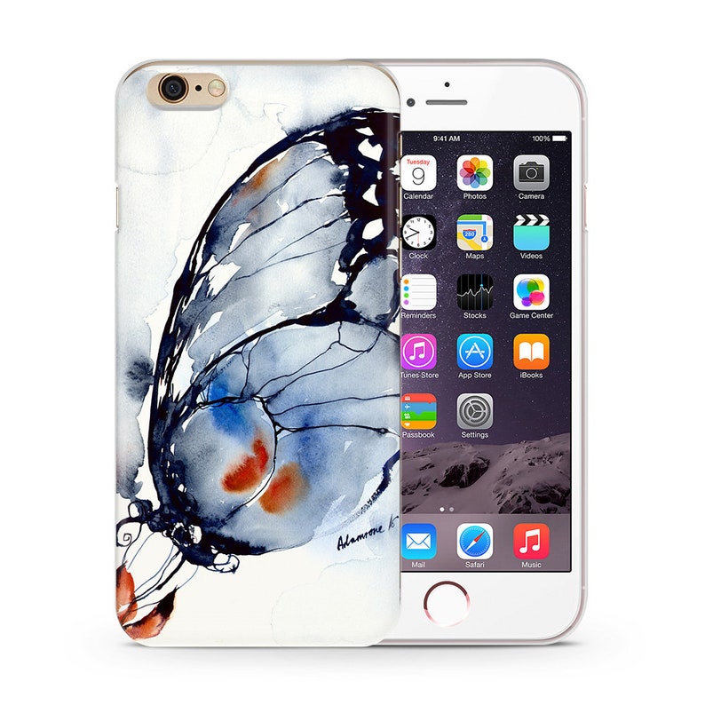 May include: A watercolor painting of a butterfly with blue, red, and white colors. The butterfly is on a white background with the artist's signature "Adamoone K" in the bottom right corner.