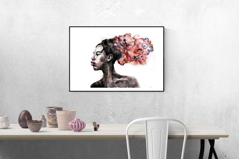 May include: A watercolor painting of a woman with a dark complexion. Her hair is styled in a large, abstract shape with shades of pink and red. The background is white.