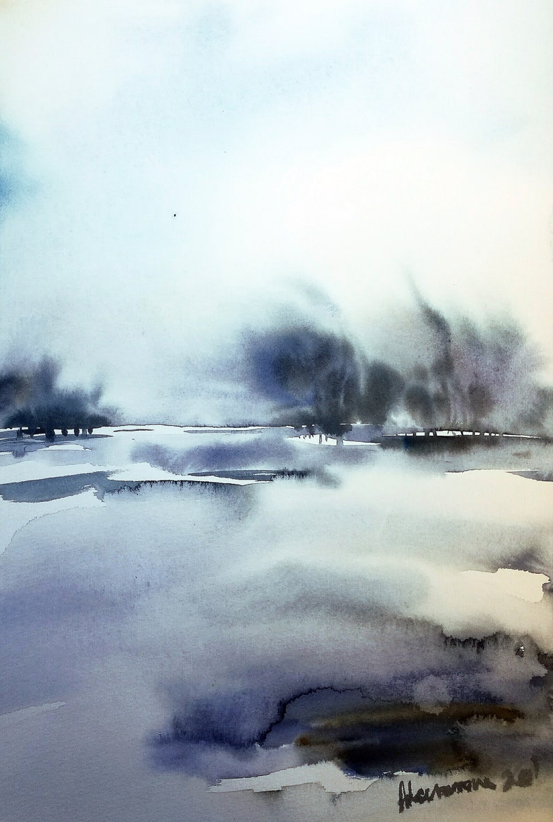 May include: Watercolour painting of a misty landscape in shades of blue and grey. The artwork depicts a body of water reflecting a hazy sky and distant trees. The artist's signature is in the bottom right corner.