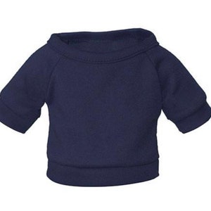 May include: A navy blue short-sleeved sweater for a pet.