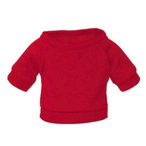 May include: A red short-sleeved crew neck t-shirt for a pet.