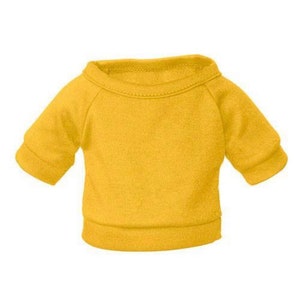 May include: A yellow short-sleeved dog sweater.