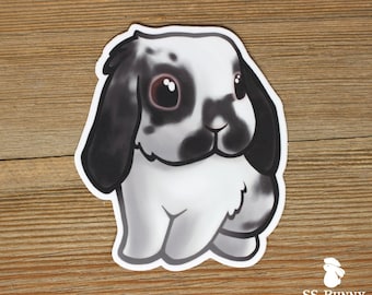Broken black lop rabbit sticker; printed chibi bunny vinyl sticker, waterproof, weatherproof