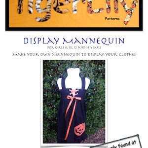 May include: A PDF pattern tutorial for making a display mannequin for girls ages 8 to 14. The mannequin is wearing a black dress with an orange ribbon and a pumpkin design. The pattern is available from Lily Pig Designs.