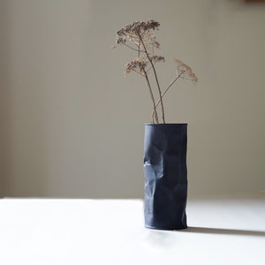 Matte black ceramic vase, unique ceramic art, crumpled vase