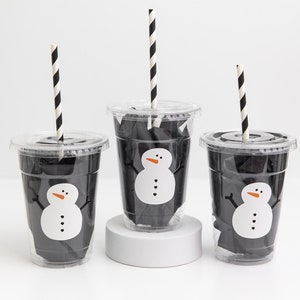 Winter and Christmas Drinks in Disposable Cups with Black Lids