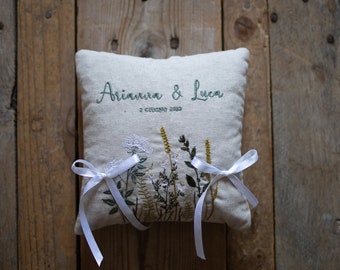 Personalized ring holder cushion with names and wildflowers