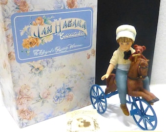 Vintage porcelain Jan Hagara Ben figurine boy on tricycle Georgetown series