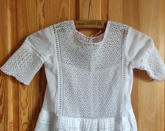 Early9th century hand sewn crochet  child's dress with pearl buttons, age 2-3