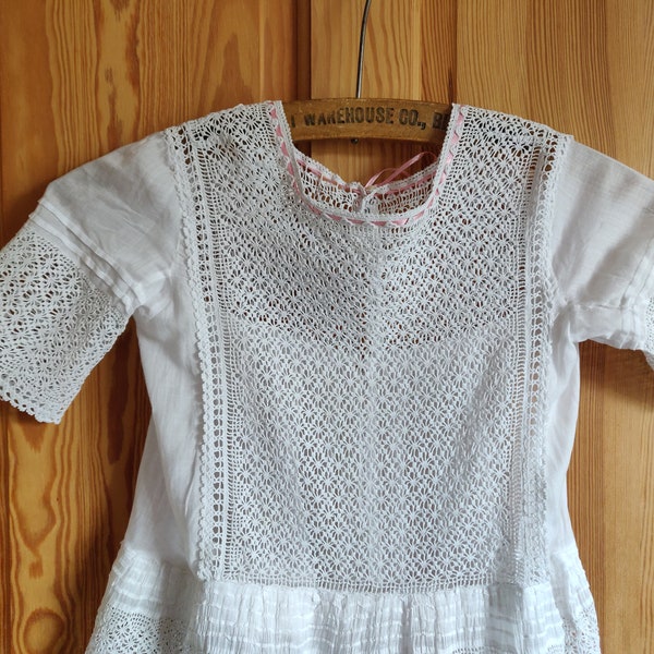 Early9th century hand sewn crochet  child's dress with pearl buttons, age 2-3