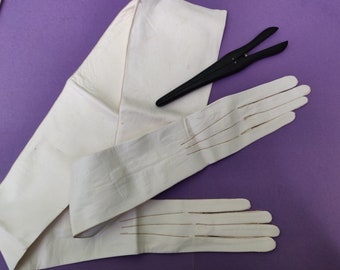 Unworn 1930s kidskin over the elbow full length gloves with ebony glove stretchers  size 6.5