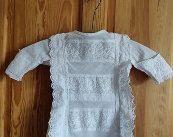 Early 20th century apron fronted aertex and broderie anglaise baby dress