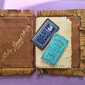 1930s Kirby Beard and Co Ltd needlecase with two collectible needlepapers