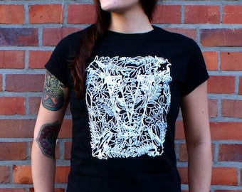 Friends not food t-shirt, with skulls and plants. Vegan art printed on a tee with many anatomical details. Vegan goth.