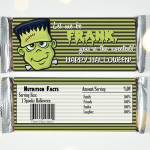 May include: Halloween-themed candy bar wrapper featuring a cartoon Frankenstein's monster with the text "Let me be FRANK, you're the sweetest! HAPPY HALLOWEEN!". The wrapper has a green and black striped background and includes a nutrition facts label.