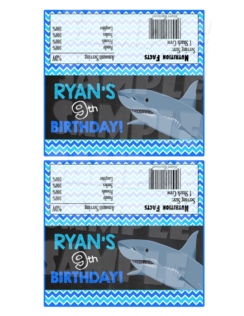 May include: A blue and white chevron patterned background with a black chalkboard. The chalkboard has the text "RYAN'S 9th BIRTHDAY!" and a cartoon shark. The nutrition facts label says "1 Shark Crew" and "Happy Birthday!"