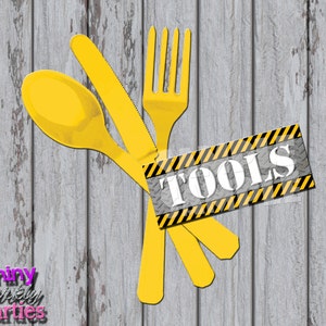 May include: Yellow plastic fork, knife, and spoon with a black and yellow construction sign that says "TOOLS" on a gray wood background.