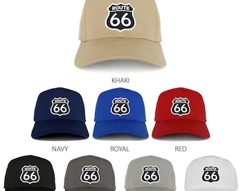 May include: A set of ten baseball caps in various colors, each featuring a white Route 66 sign with black text. The colors include khaki, navy, royal blue, red, black, charcoal, grey, and white.
