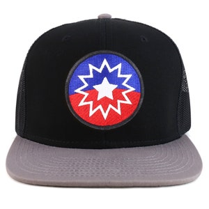 May include: Black and gray trucker hat with a red, white, and blue starburst logo. The logo is a circle with a white star in the center and a red and blue starburst around it.