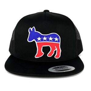 May include: Black and red trucker hat with a blue and white donkey silhouette and five stars. The hat has a black mesh back and a black snap closure. The hat has a white label on the back that says "The Classics Snapback Yupoong Since 1975."