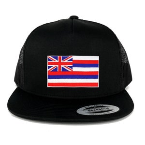 May include: Black trucker hat with a red, white, and blue Hawaiian flag patch. The hat has a black mesh back and a black snap closure. The hat is labeled "The Classic Snapback Yupoong Since 1975."