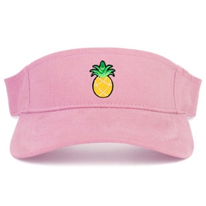 May include: Pink visor with a yellow pineapple embroidered on the front.