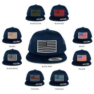 May include: A set of ten trucker hats with a variety of colors and American flag patches. The hats are all navy blue with a mesh back. The patches include a black and white flag, a red flag, a white flag, a yellow flag, a desert camouflage flag, a black olive flag, a thin red line flag, a thin blue line flag, and a black and grey flag.