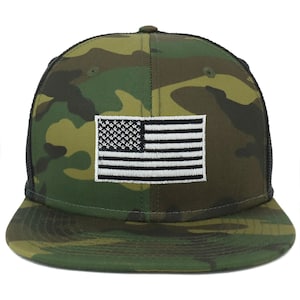 May include: A black and green camouflage trucker hat with a white and black American flag patch on the front.