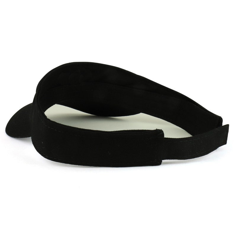 May include: A black visor with a wide brim and an adjustable strap. The visor is made of a soft, comfortable fabric.