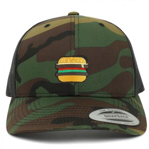 May include: A camouflage trucker hat with a black mesh back. The hat has an embroidered image of a hamburger with cheese, lettuce, and tomato.