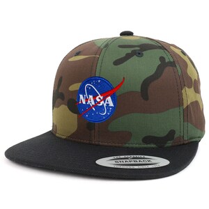 May include: A camouflage green and black baseball cap with a blue and red NASA logo embroidered on the front. The cap has a black brim and a black snap closure.