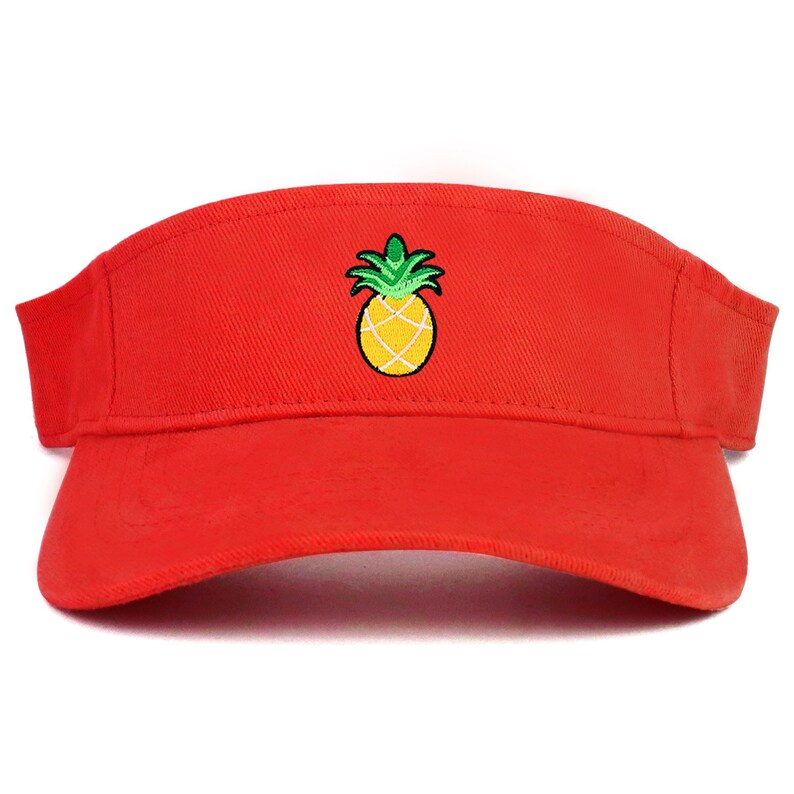 May include: A red visor with a yellow pineapple embroidered on the front.